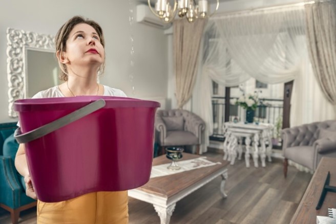 A person holding a laundry basket